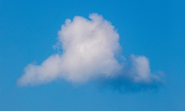 A singular cloud pictured against a blue sky | SAP