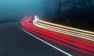 Long exposure image of traffic passing through one way on a road | ArchLynk