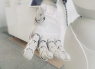 A robotic hand reaching out to the camera | AI Avvale SAP