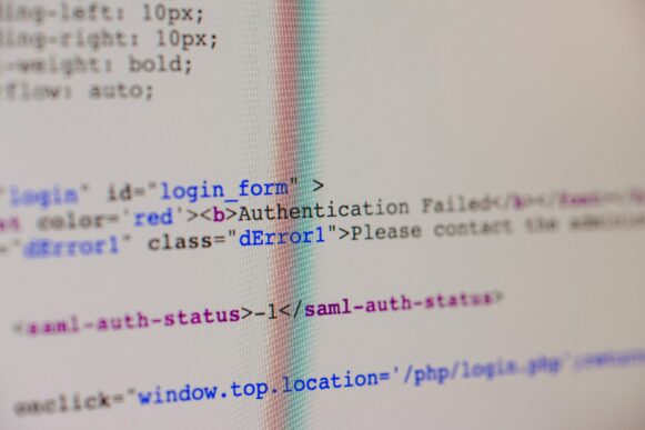 photograph of a code with the focus on the word "error" in the middle of the page