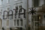 photograph of a window reflection with the word "data" inscribed on it - data concept