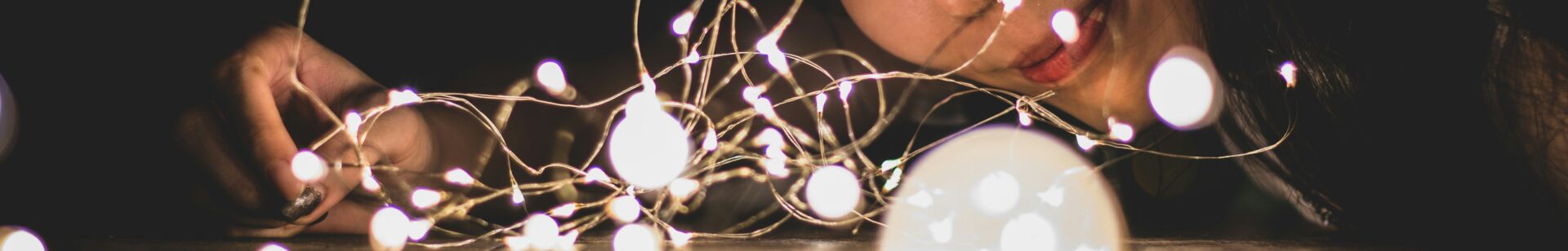 Image of a person looking down a string of lights | Boomi SAP