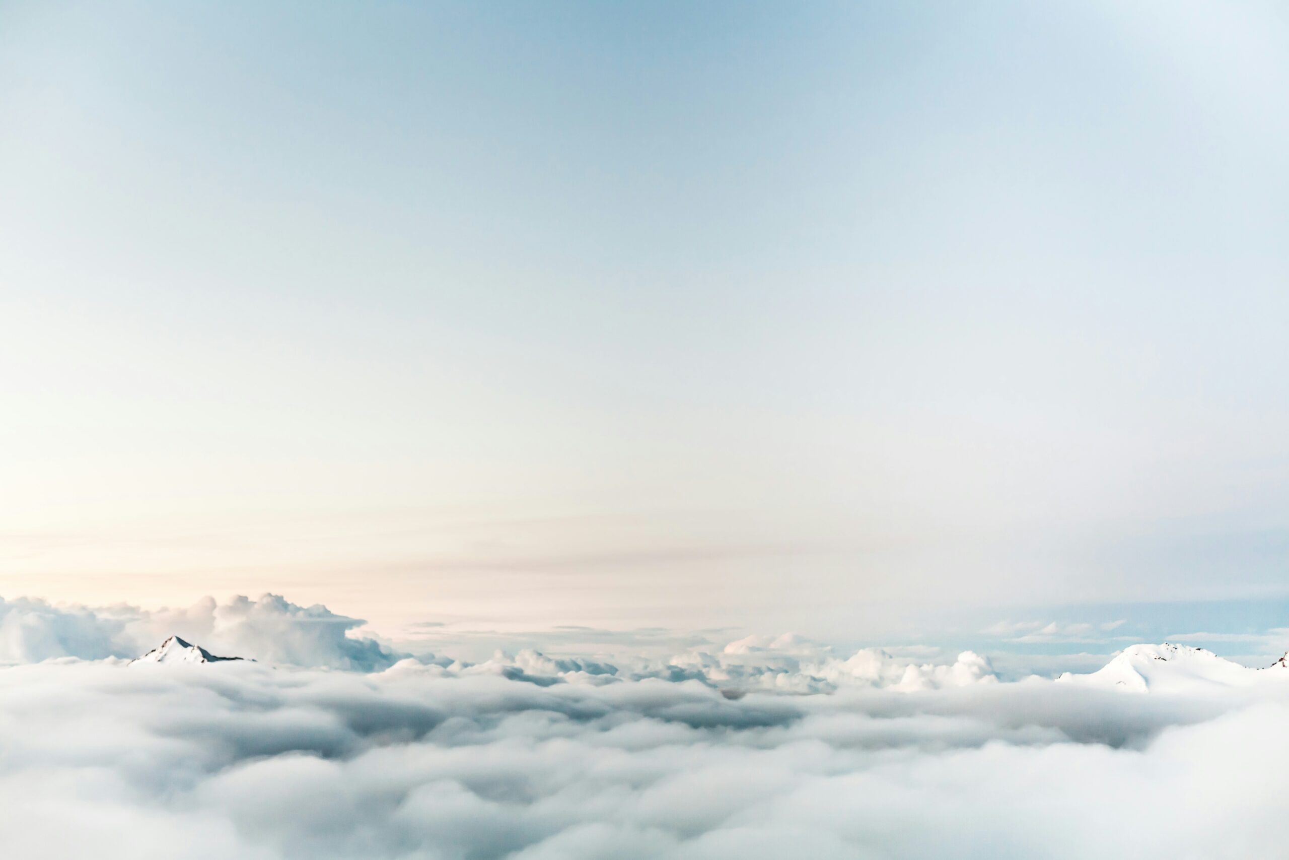 photo taken above clouds looking into the sky horizon | STA Technologies ITSM Connector solution for SAP Cloud ALM