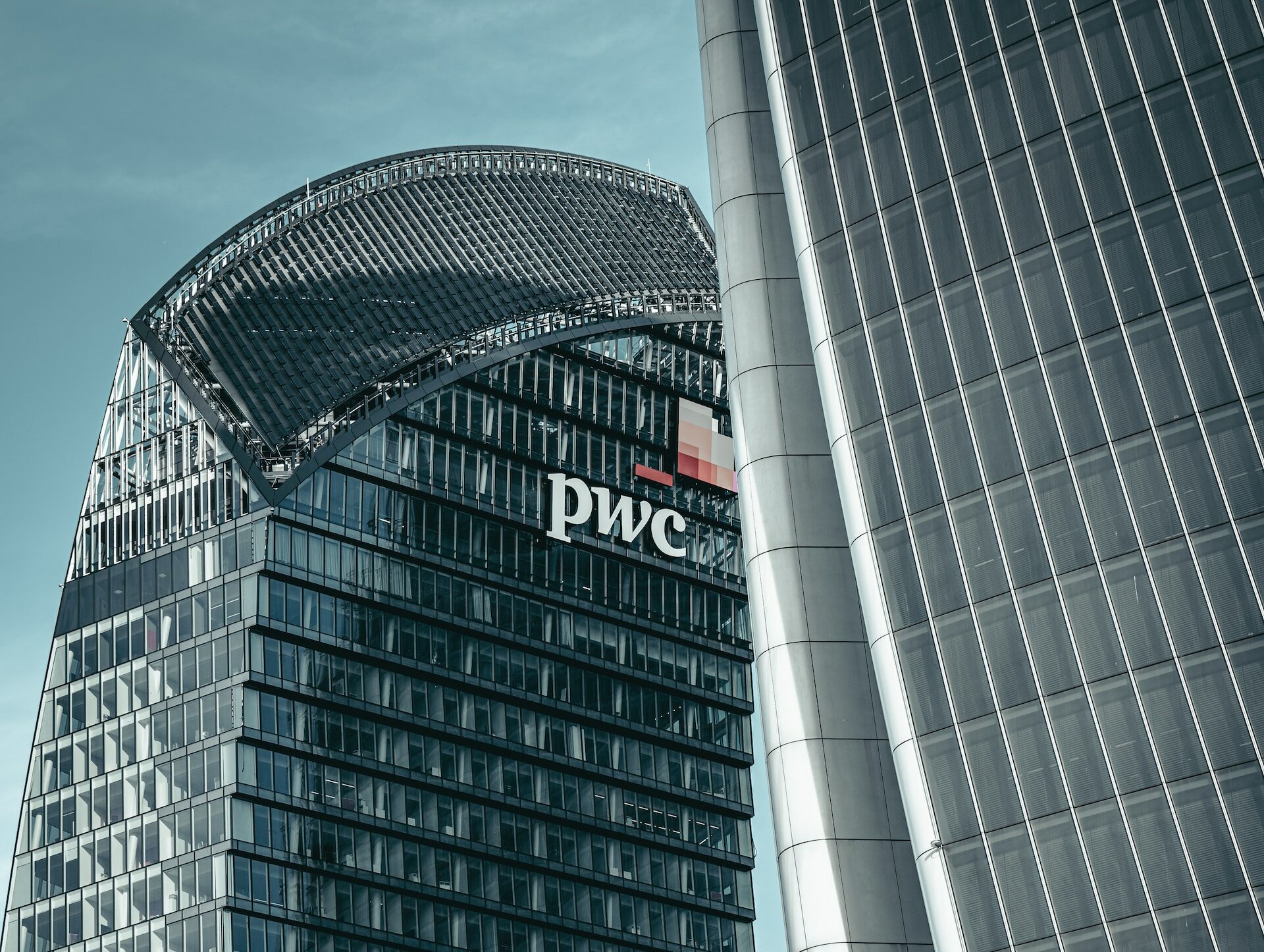 PwC tall building | Tapping in GenAI’s potential bravely but securely