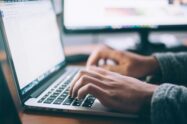 close up of a person's hands typing on a laptop | SIOS Technology Corp Disaster Recovery solution