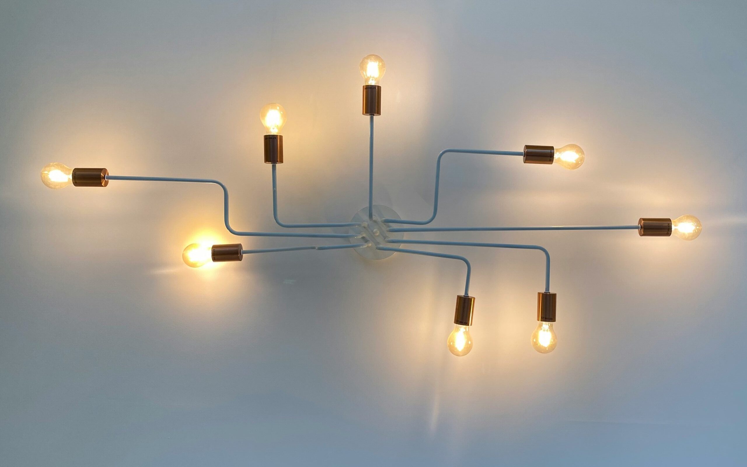 interconnected light bulbs hanging on a wall | SAP Product Review of SAP Signavio Business Transformation Suite