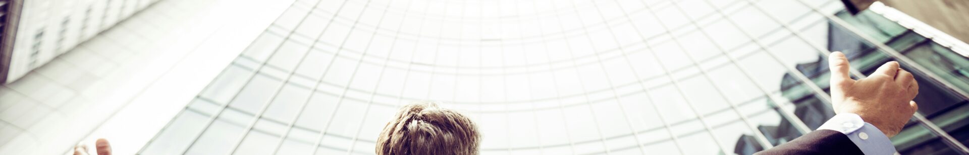 a person looking up to the sky with open hands