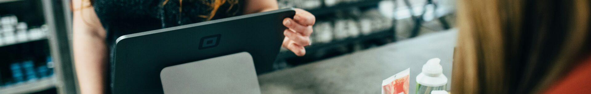 woman holding credit card