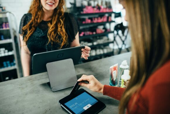 woman holding credit card