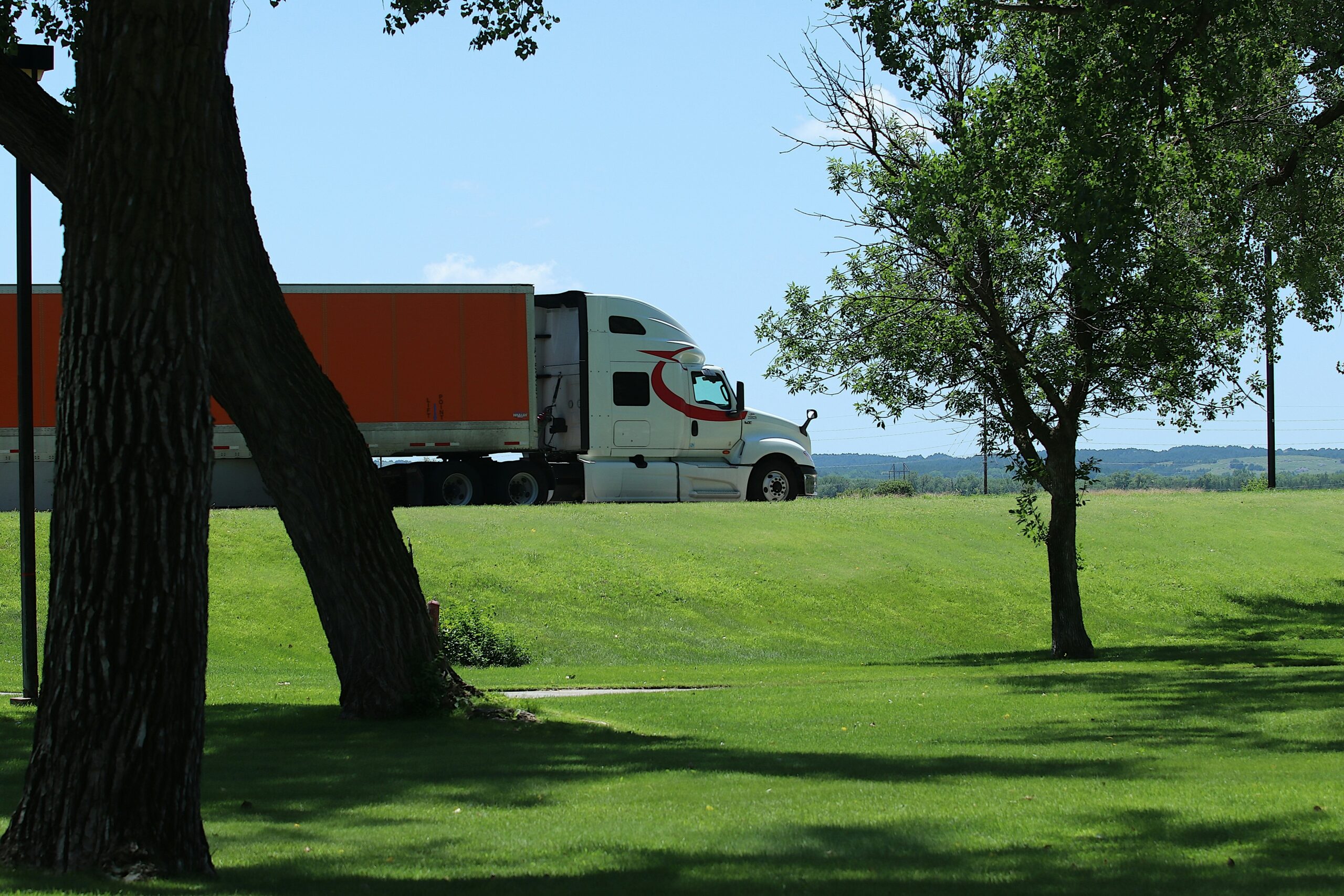 Orange and White Semi Truck