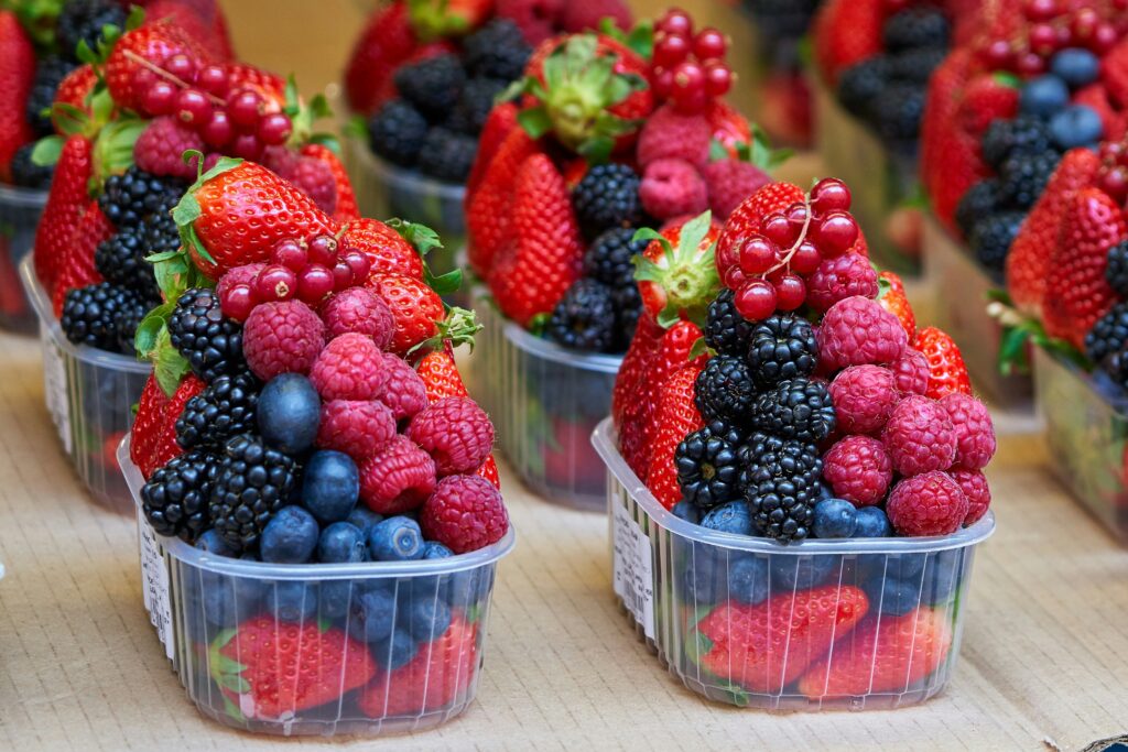 Mixed berries in containers