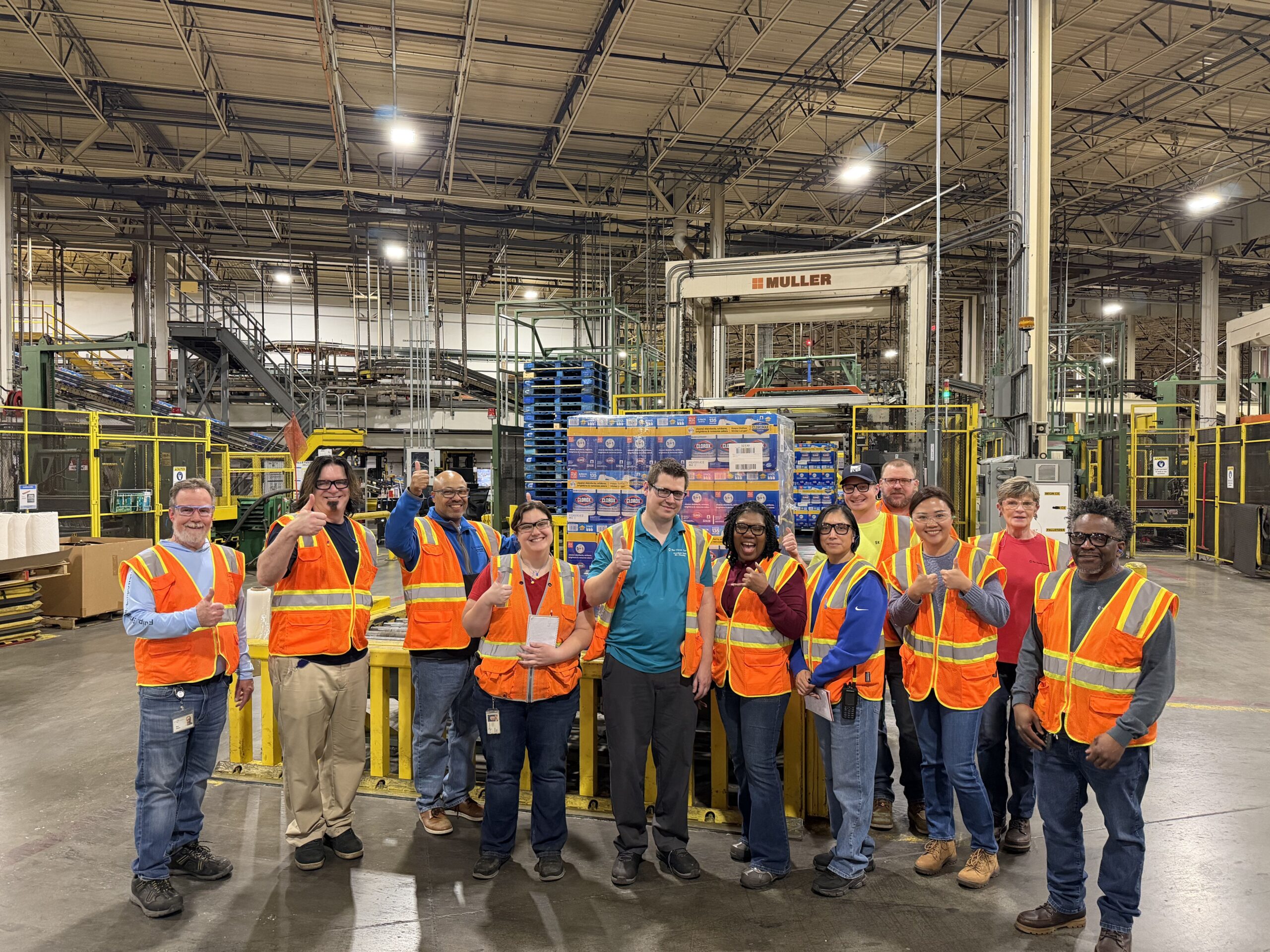Clorox manufacturing team at Aberdeen, MD plant standing on production floor during SAP S/4HANA transformation.