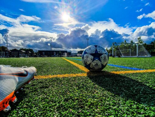 blue-and-grey-soccer-ball-on-green-field-under-white-and-blue-sky-during-daytime_SAP AI football TSG Hoffenheim