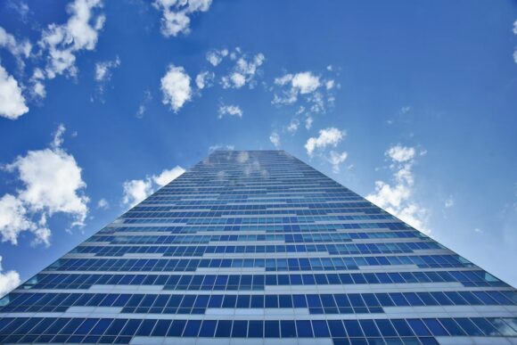 Modern office tower representing Flintfox’s Clean Core pricing extension for SAP S/4HANA