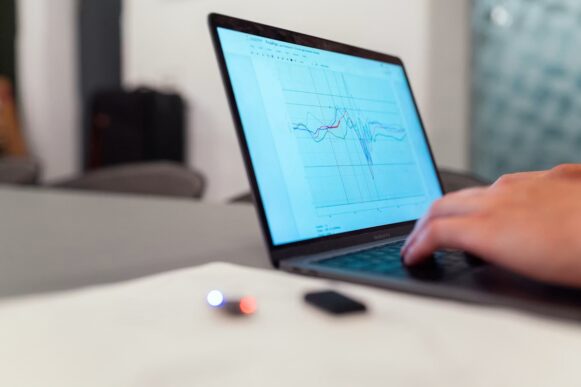 Laptop screen showing data graphs, representing SAP product data workflows and enterprise integration.