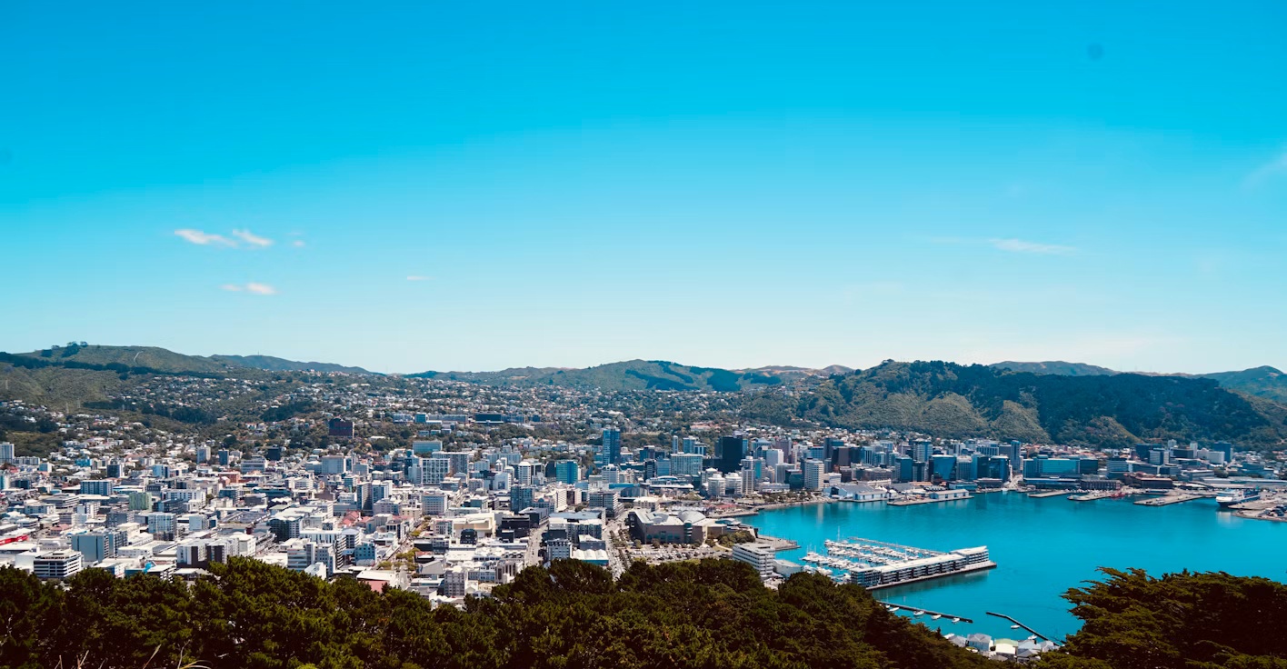 View of Wellington, New Zealand, home to Xero’s global headquarters, showing the city skyline, harbor, and surrounding hills.