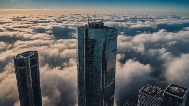 Skyscrapers rising above clouds illustrate the layered SAP systems affected by July 2026 security patches.