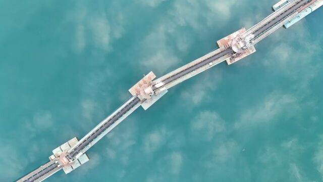Aerial view of a bridge over water representing trusted pathways across the SAP estate.