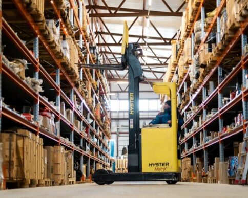 Forklift operator retrieving warehouse inventory for available-to-promise order fulfillment supported by SAP Business One