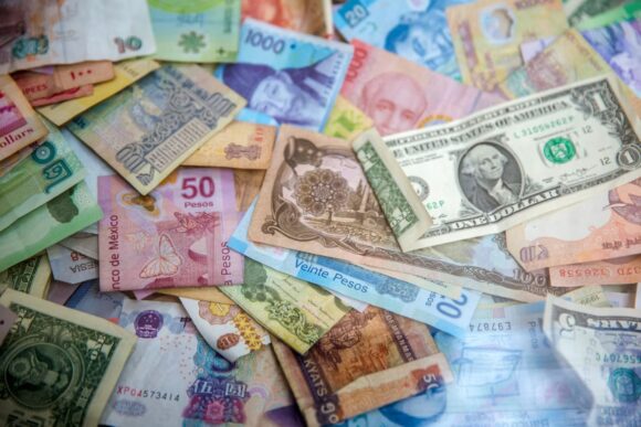 International banknotes representing multicurrency and cross-border payment activity