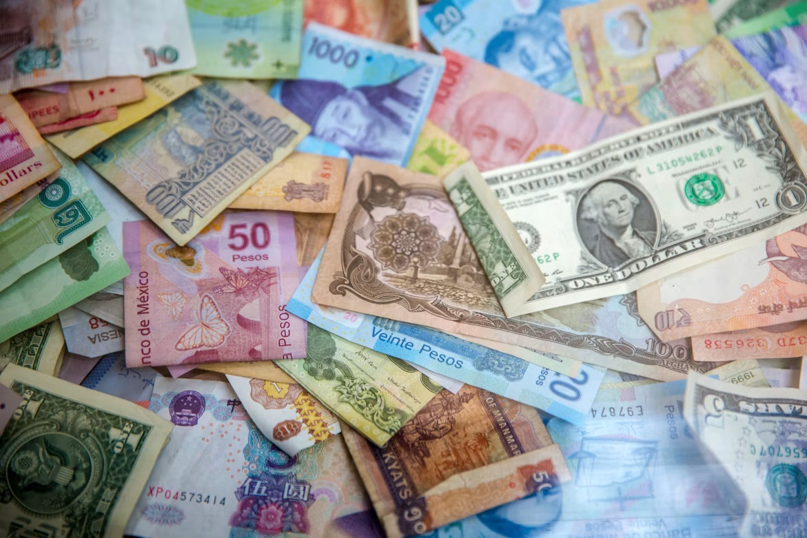 International banknotes representing multicurrency and cross-border payment activity