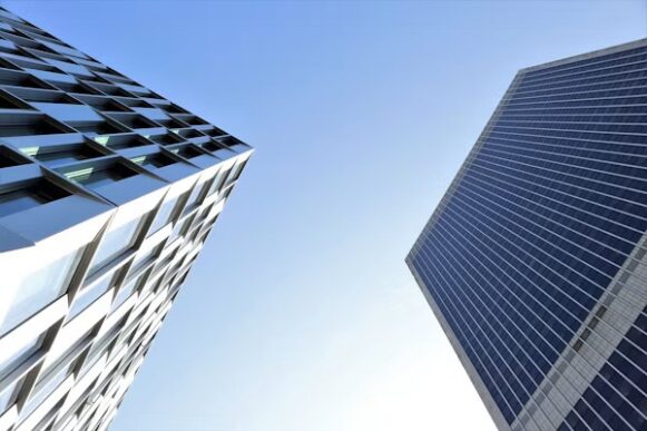 Modern office buildings illustrate Palantir enterprise interoperability and open architecture across connected systems