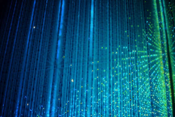 Abstract blue and green data streams representing SAP AI product data and connected information systems