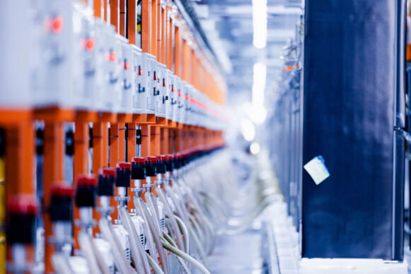 Automated manufacturing equipment illustrating SAP MII security risks highlighted in SAP Security Patch Day August 2026.