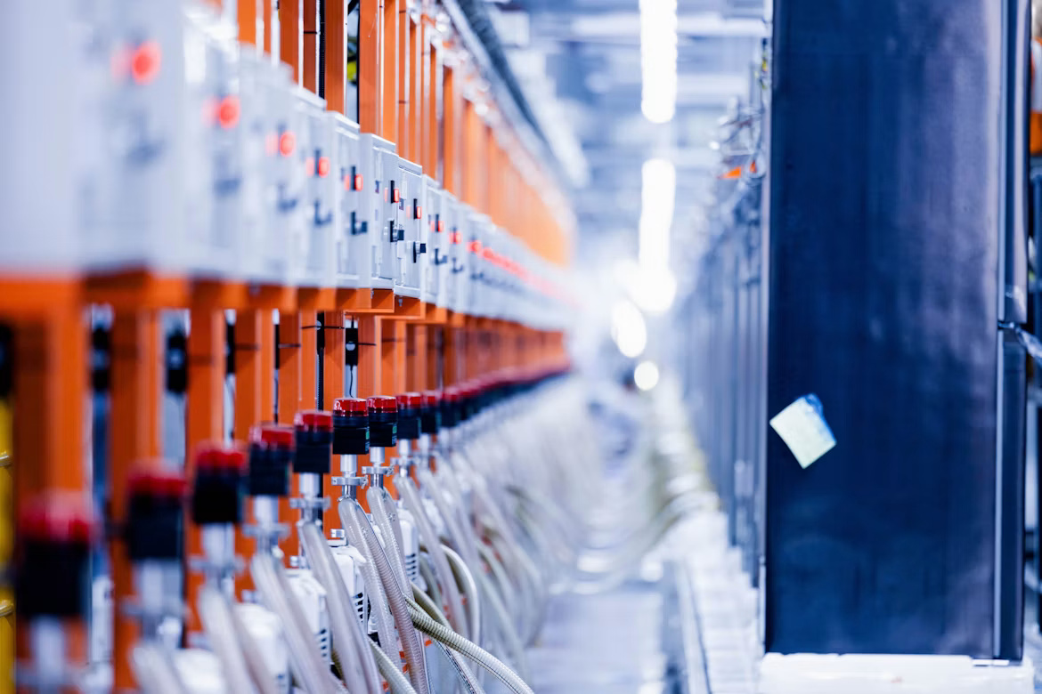 Automated manufacturing equipment illustrating SAP MII security risks highlighted in SAP Security Patch Day August 2026.