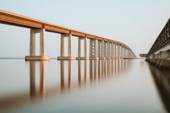 Bridge infrastructure representing ERP-connected tax automation and integrated compliance processes.